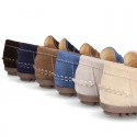 Suede leather kids moccasins shoes with detail mask and driver type Outsole.