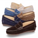 Suede leather kids moccasins shoes with detail mask and driver type Outsole.