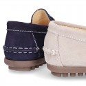 Suede leather kids moccasins shoes with detail mask and driver type Outsole.