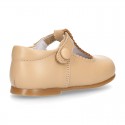 Classic Nappa leather T-strap shoes with velcro strap closure with button.