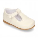 Classic Nappa leather T-strap shoes with velcro strap closure with button.