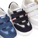 Combined canvas suede leather kids tennis shoes with hook and loop strap .