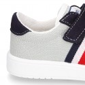 Combined canvas suede leather kids tennis shoes with hook and loop strap .