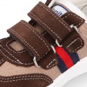 Combined canvas suede leather kids tennis shoes with hook and loop strap .