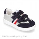 Combined canvas suede leather kids tennis shoes with hook and loop strap .
