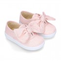 Metal canvas Bamba shoes with sweet BOW design.