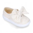 Metal canvas Bamba shoes with sweet BOW design.