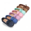 Nobuck leather Moccasin shoes with bows for little kids.