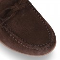 Suede leather Moccasin shoes with bows for toddler kids.