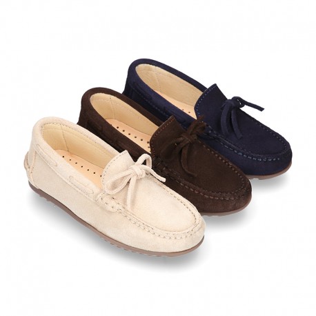 Suede leather Moccasin shoes with bows for toddler kids.