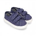 Zapatilla con doble velcro en lona jeans con ESTRELLAS.