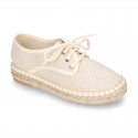 Laces up espadrille shoes in washing effect cotton canvas in pastel colors.