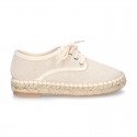 Laces up espadrille shoes in washing effect cotton canvas in pastel colors.