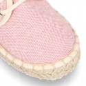 Laces up espadrille shoes in washing effect cotton canvas in pastel colors.