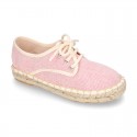 Laces up espadrille shoes in washing effect cotton canvas in pastel colors.