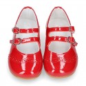 Classic little Mary Jane shoes in RED patent leather with double buckle fastening and perforated design.