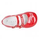 Classic little Mary Jane shoes in RED patent leather with double buckle fastening and perforated design.