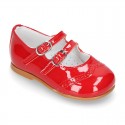 Classic little Mary Jane shoes in RED patent leather with double buckle fastening and perforated design.