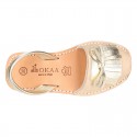 Classic rear strap Menorquina shoes with fringed design in extra soft nappa leather and metal finish.