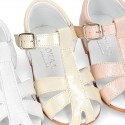 METAL leather Little caged Sandal shoes with buckle fastening.