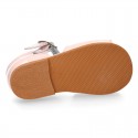 Patent leather Little T-Strap Sandal shoes with buckle fastening and with bows and pearls design.