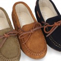 Classic Suede leather Moccasin shoes with Bows in leather color design.