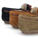 Classic Suede leather Moccasin shoes with Bows in leather color design.