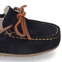 Classic Suede leather Moccasin shoes with Bows in leather color design.