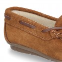 Classic Suede leather Moccasin shoes with Bows in leather color design.