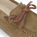 Classic Suede leather Moccasin shoes with Bows in leather color design.