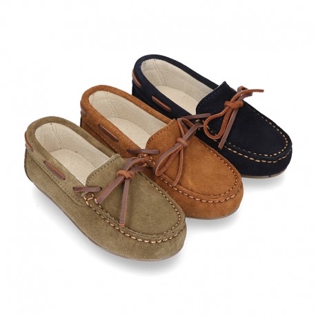 Classic Suede leather Moccasin shoes with Bows in leather color design.