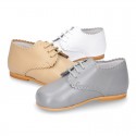 Classic little LACES UP style shoes in nappa leather with scallop.