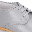 Classic little LACES UP style shoes in nappa leather with scallop.