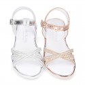 Metal finish leather sandal shoes with SHINY design and white soles.