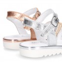 Metal finish leather sandal shoes with SHINY design and white soles.