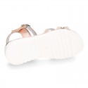 Metal finish leather sandal shoes with SHINY design and white soles.