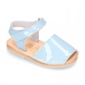 Patent leather Menorquina sandals with hook and loop strap.