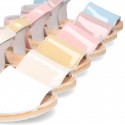 Patent leather Menorquina sandals with hook and loop strap.