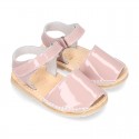 Patent leather Menorquina sandals with hook and loop strap.