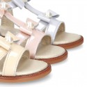 Patent Leather T-Strap Sandal shoes with BOWS and PEARLS for toddler girls.