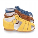 Suede leather little Sandal shoes with buckle fastening.