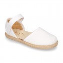 White canvas espadrille shoes with LACES design and velcro strap closure.