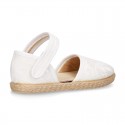 White canvas espadrille shoes with LACES design and velcro strap closure.