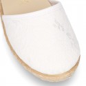 White canvas espadrille shoes with LACES design and velcro strap closure.
