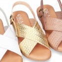 ENGRAVED design Leather sandal shoes with crossed straps.