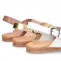 ENGRAVED design Leather sandal shoes with crossed straps.