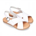 ENGRAVED design Leather sandal shoes with crossed straps.