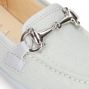 Cotton canvas Moccasin shoes with stirrup detail for toddler boys.