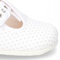 Cotton canvas T-Strap shoes with blue polka dots design.