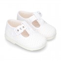 Cotton canvas T-Strap shoes with blue polka dots design.